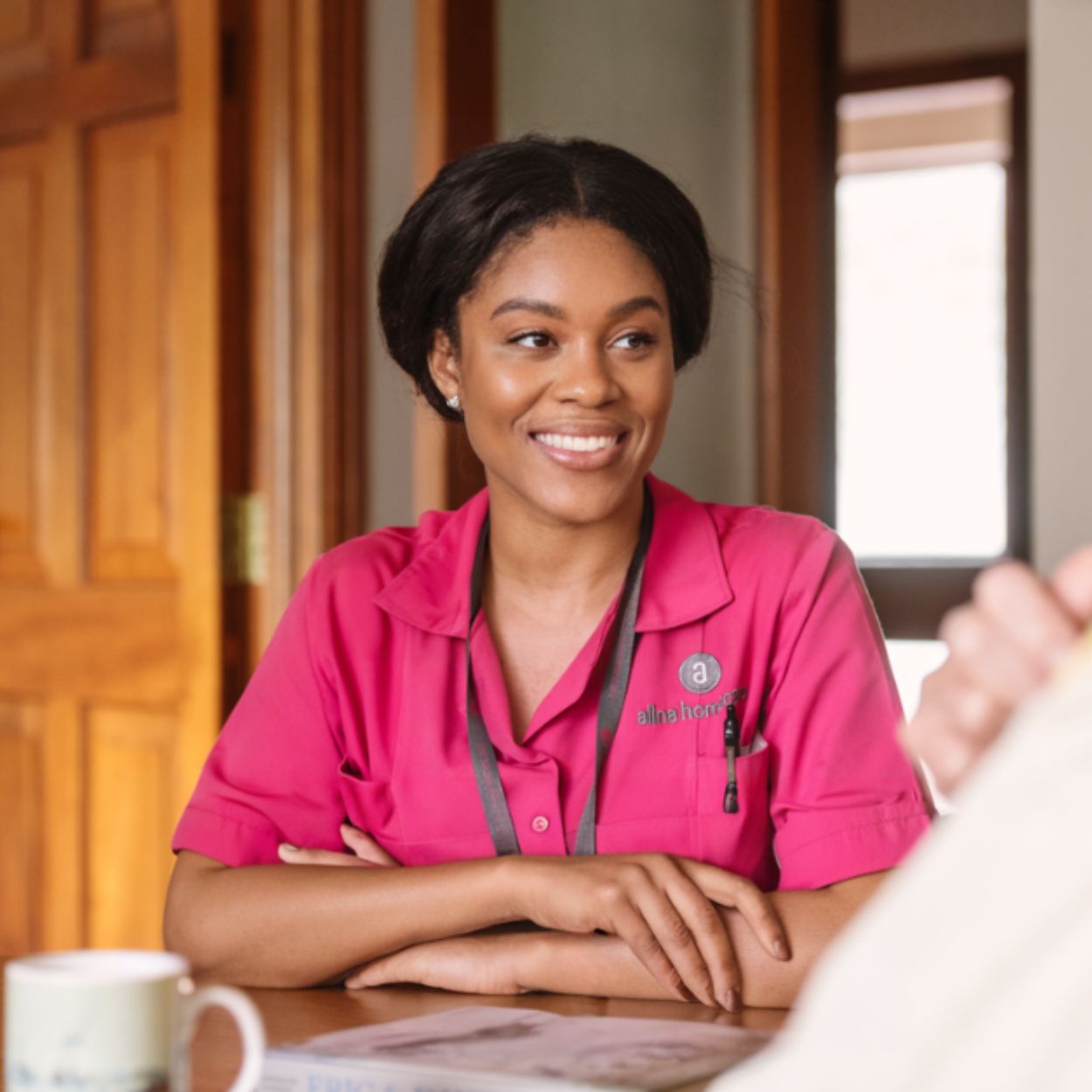 care assistant with an alina homecare job smiling